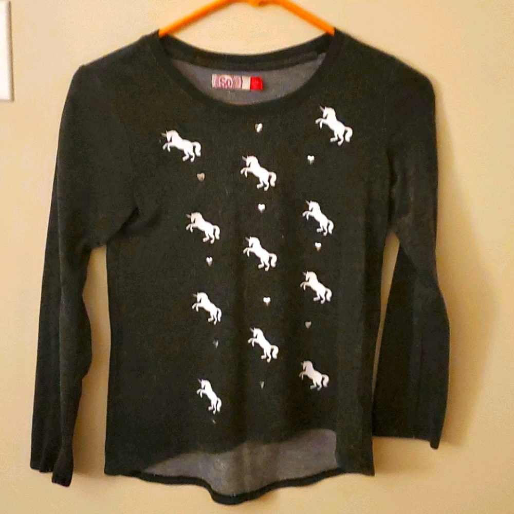 Kids Black Shirt with White Unicorns on it.